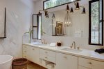 Principle Bathroom with double sinks